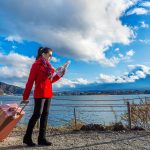 Tourist with baggage and map at Fuji mountain, Kawaguchiko in Ja